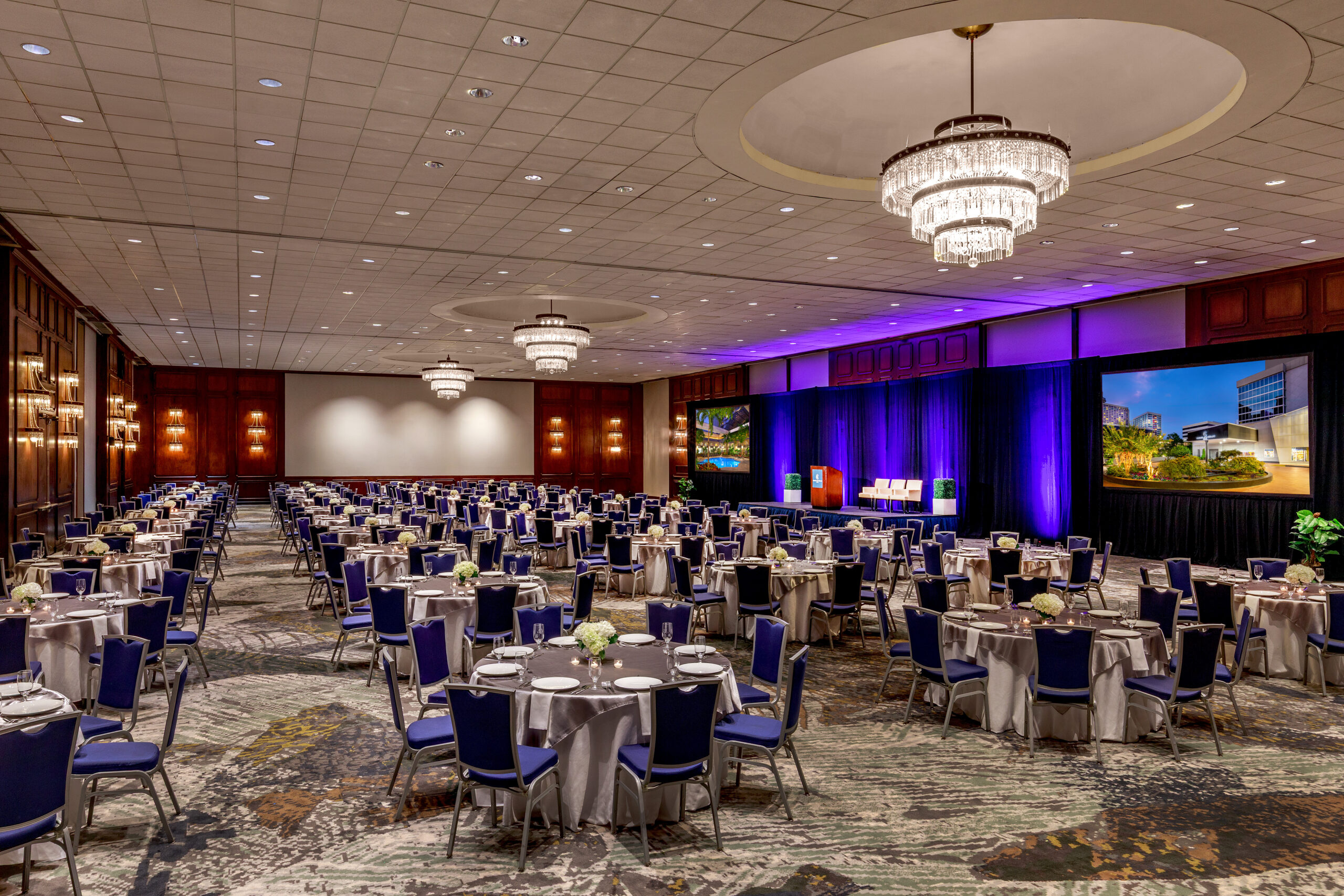 The Capitol Ballroom at the Courtland Grand Hotel in downtown Atlanta — crystal chandeliers over formal banquet seating